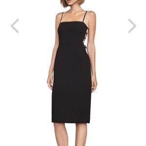 BCBG “Esmee” lace up black midi dress.  NWT.